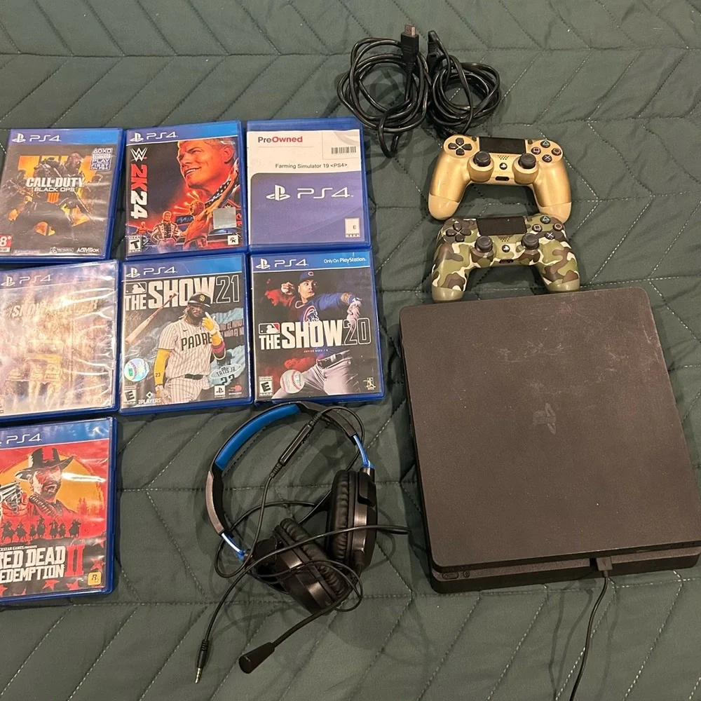 Sony Black and Gold Console with DualShock Controller